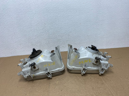 1999-2004 Nissan Pathfinder Left+Right Side Set Halogen Headlights AC5823 DW7