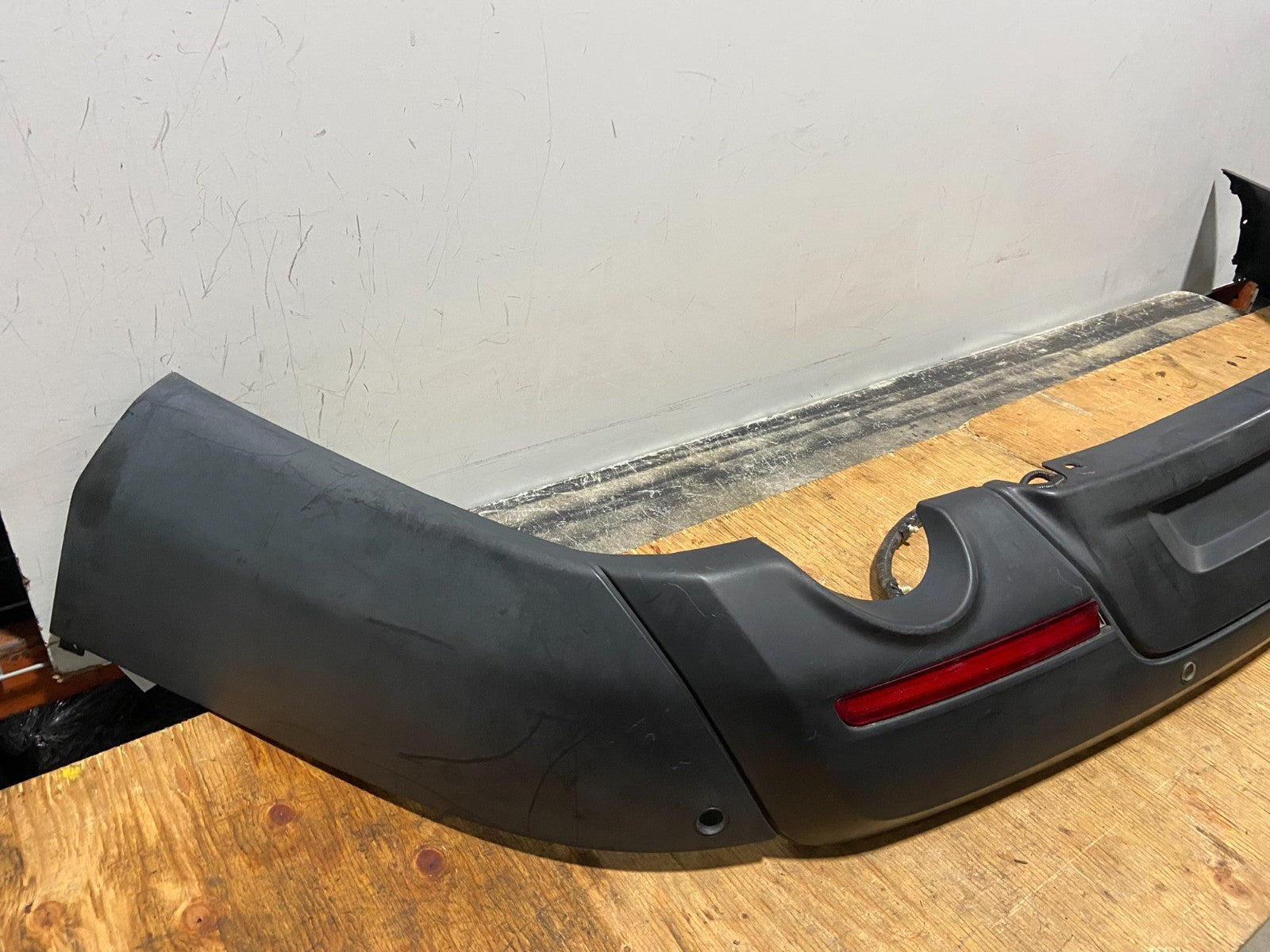 2011 to 2015 Ford Explorer Rear Bumper Cover NO TOW HOOK Q12771