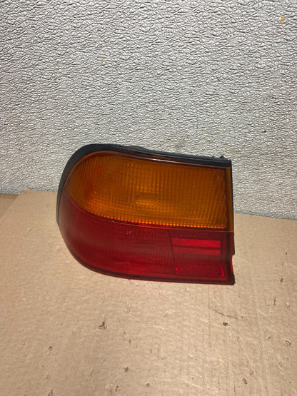 1995 1996 Nissan Maxima Left Driver LH Side Tail light Oem AB2429 DW0