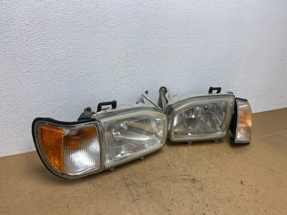1999-2004 Nissan Pathfinder Left+Right Side Set Halogen Headlights Oem AC3302 DW2