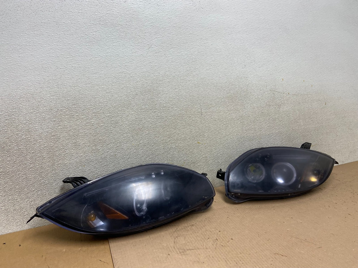 2006 - 2007 Mitsubishi Eclipse Left+Right Side Halogen Headlights AA0389 DW2