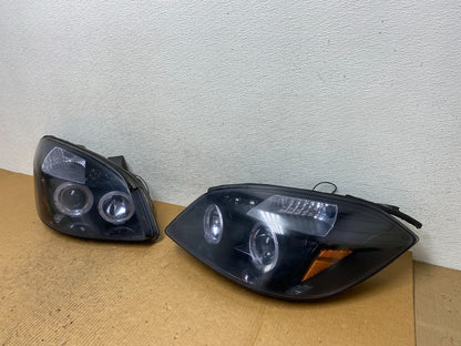 2005 - 2010 Chevrolet Cobalt Sedan Left+Right Headlights AE1408 DG1