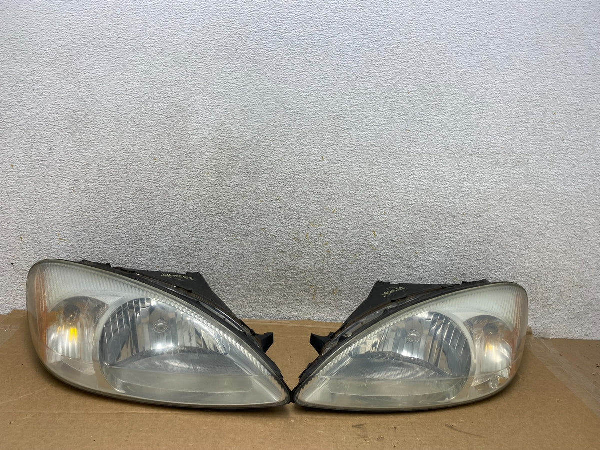 2000 to 2007 Ford Taurus Left+Right Side Halogen Headlights AH8252 DW0