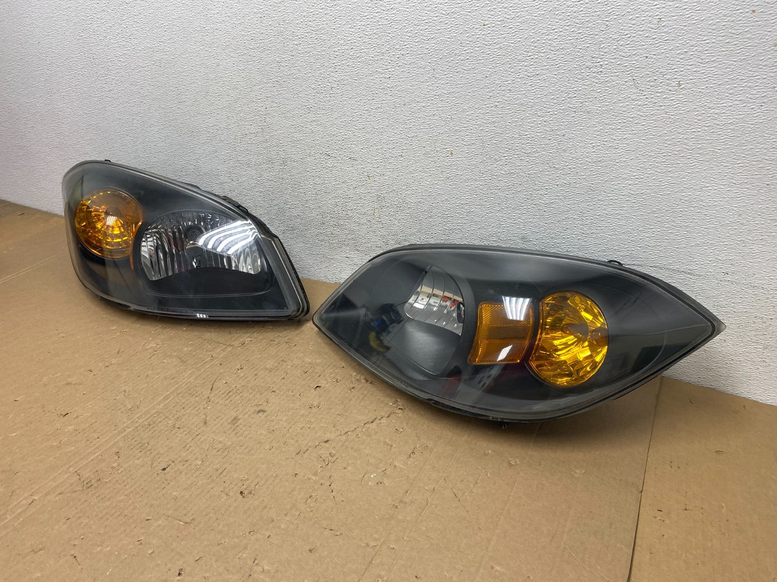 2005 - 2010 Chevrolet Cobalt Sedan Left+Right Set Headlights AD8035 DW1