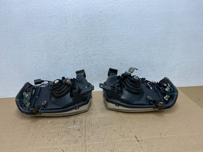 2001 to 2004 Nissan Frontier Left+Right Halogen Headlights AE6473 DW5