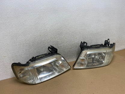 2005 to 2007 Mercury Mariner Left+Right Side Halogen Headlights AJ2371 DW2