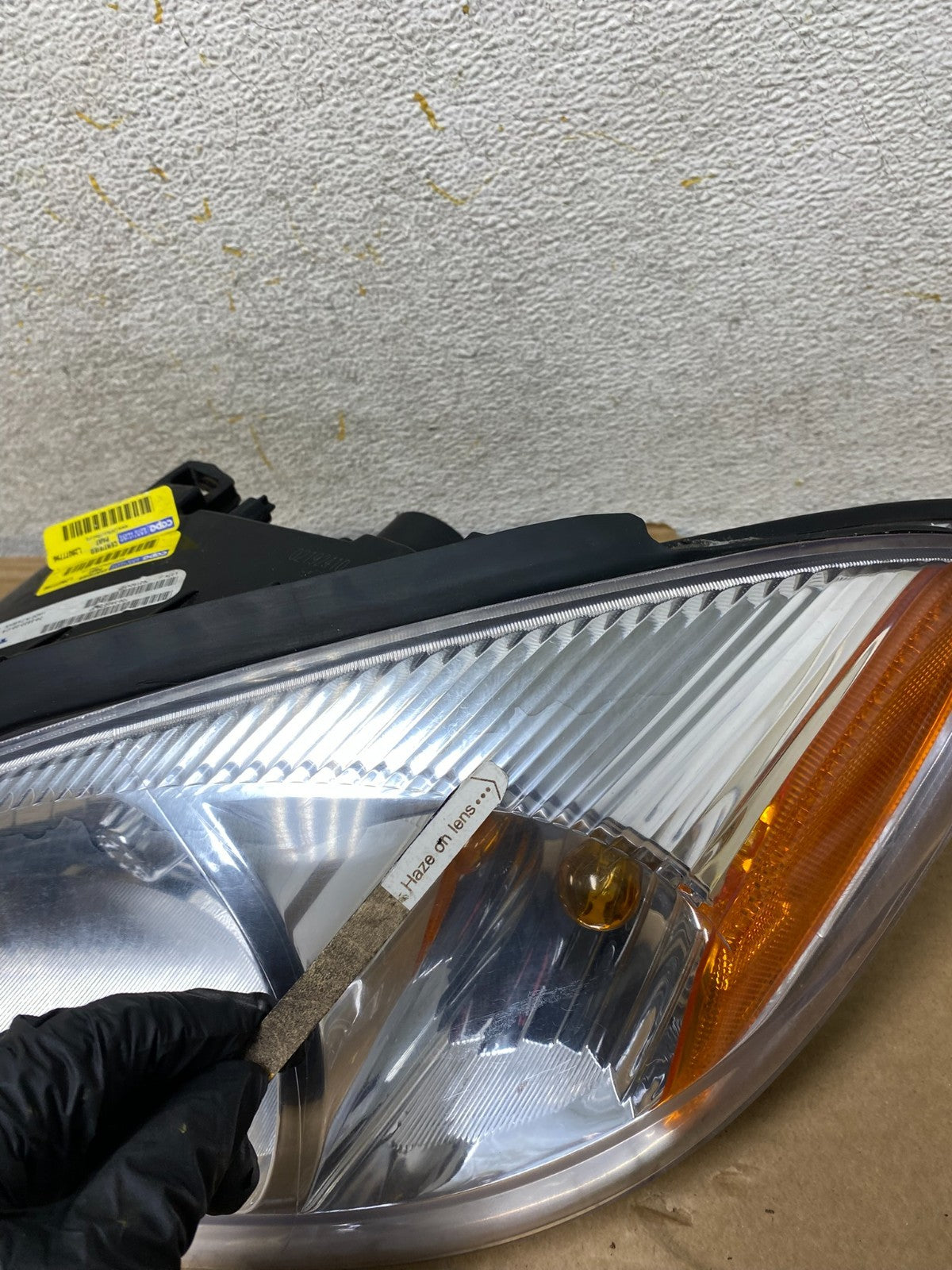 2000 to 2007 Ford Taurus Left Driver LH Side Halogen Headlight TYC AH8257 DW3