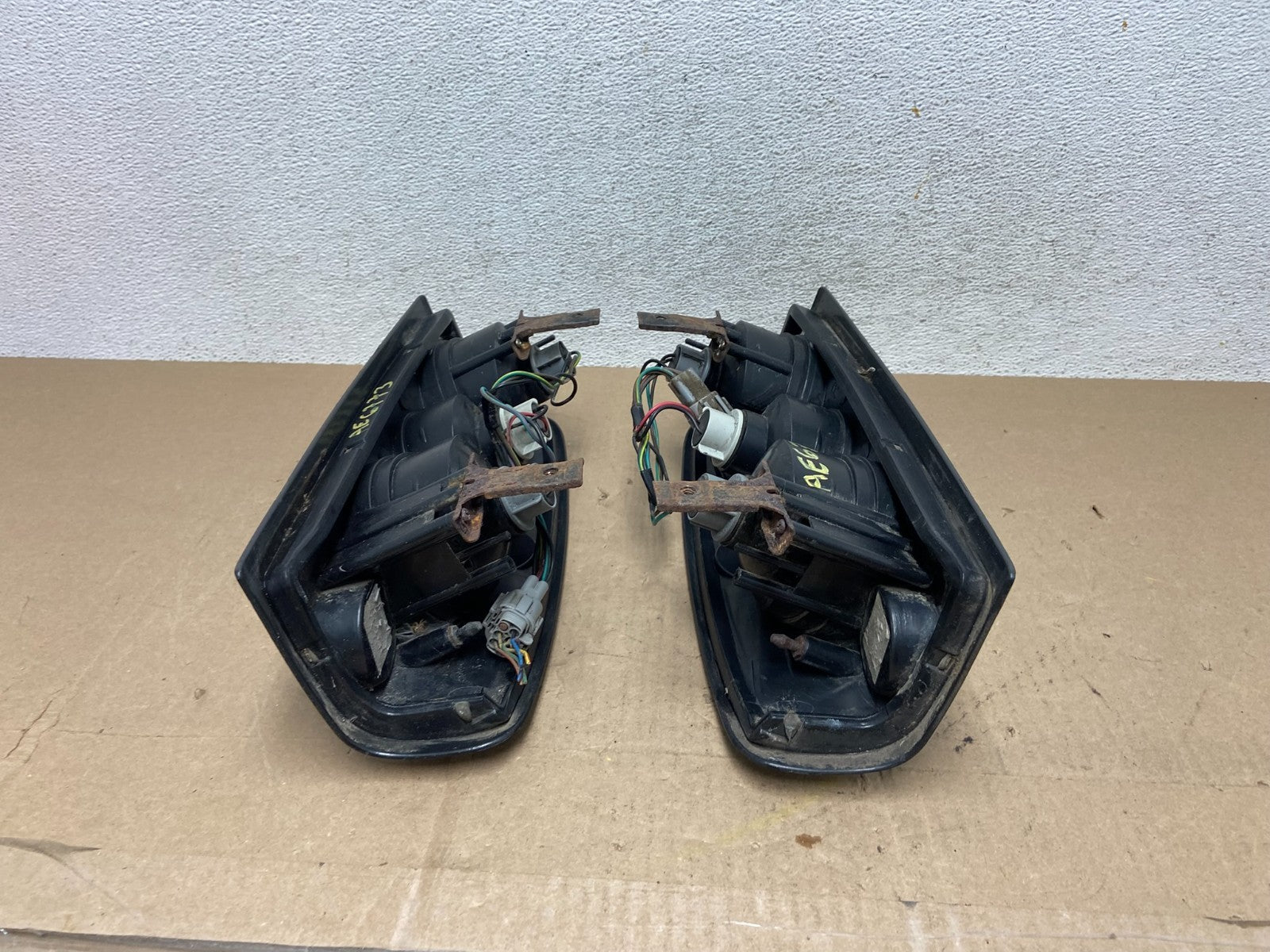 1998 to 2004 Nissan Frontier Left+Right Set Black Side Tail lights AE6773 DG9