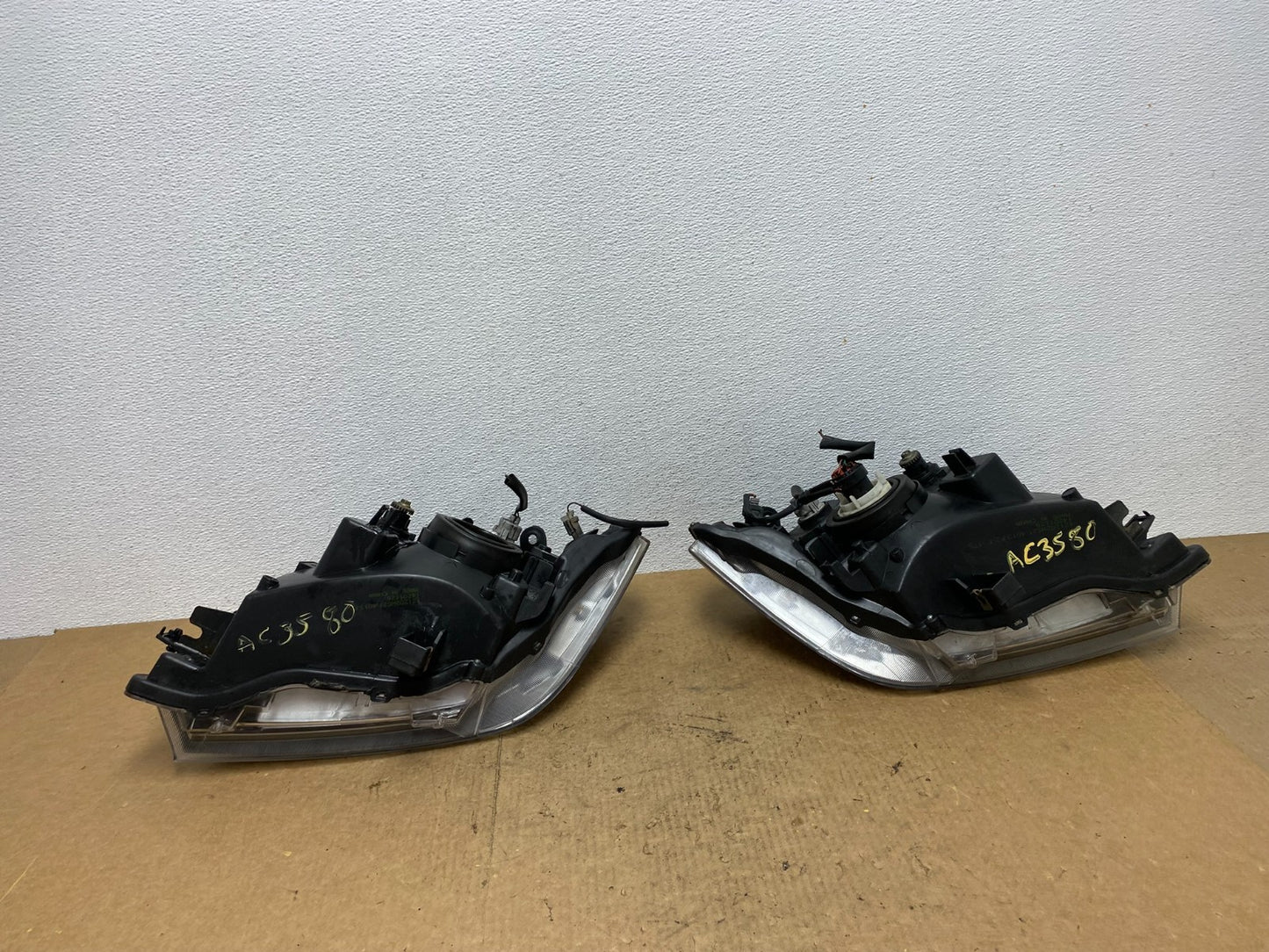 2008 to 2012 Nissan Pathfinder Halogen Headlight Left+Right Set AC3580 DW8