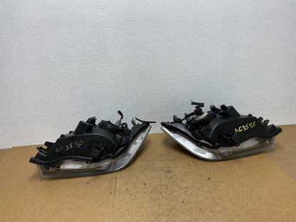 2008 to 2012 Nissan Pathfinder Halogen Headlight Left+Right Set AC3580 DW8