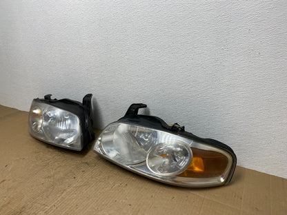 2004 - 2006 Nissan Sentra Halogen Left+Right Headlights AB8409 DW1