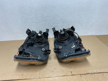2001 to 2004 Nissan Frontier Left+Right Halogen Headlights AE6473 DW7