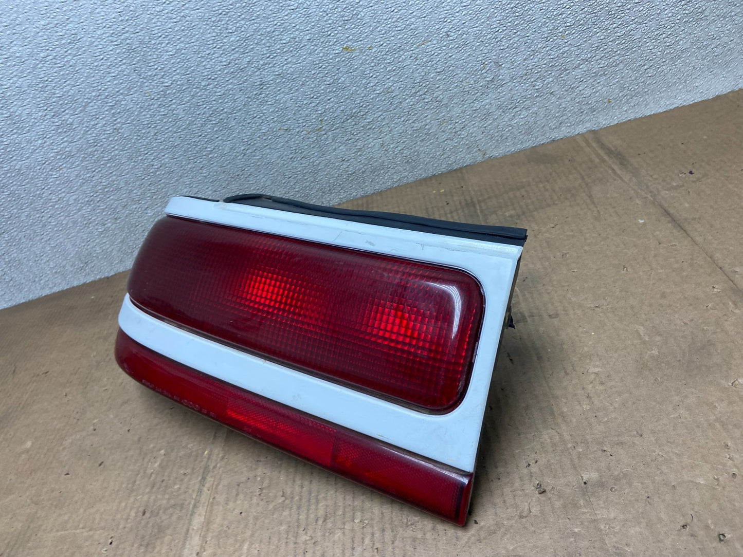 1992 to 1994 Plymouth Laser Left Driver Side tail Light AA64031