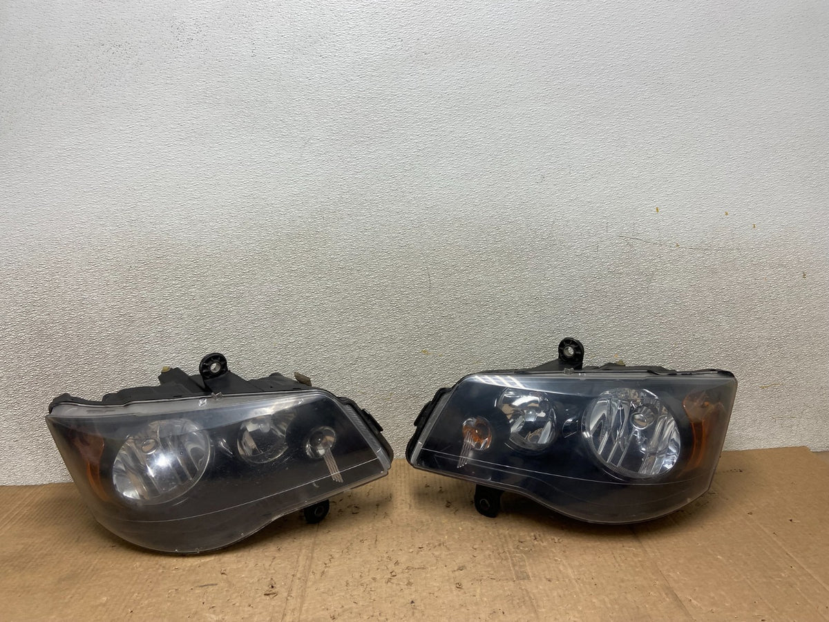 2008 to 2016 Chrysler Town and Country Left+Right Side Headlights AA7122 DW0