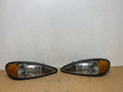 1999 to 2005 Pontiac Grand Am Left+Right Set Headlights AD1184 DG0