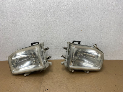 1999-2004 Nissan Pathfinder Left+Right Side Set Halogen Headlights AC5823 DW0