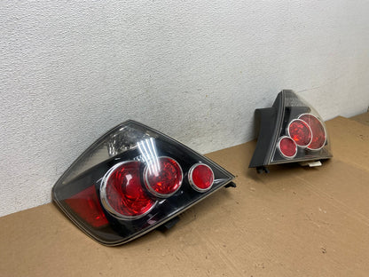 2007 to 2010 Scion TC Left+Right Set Black Tail Lights AD7924 LK2