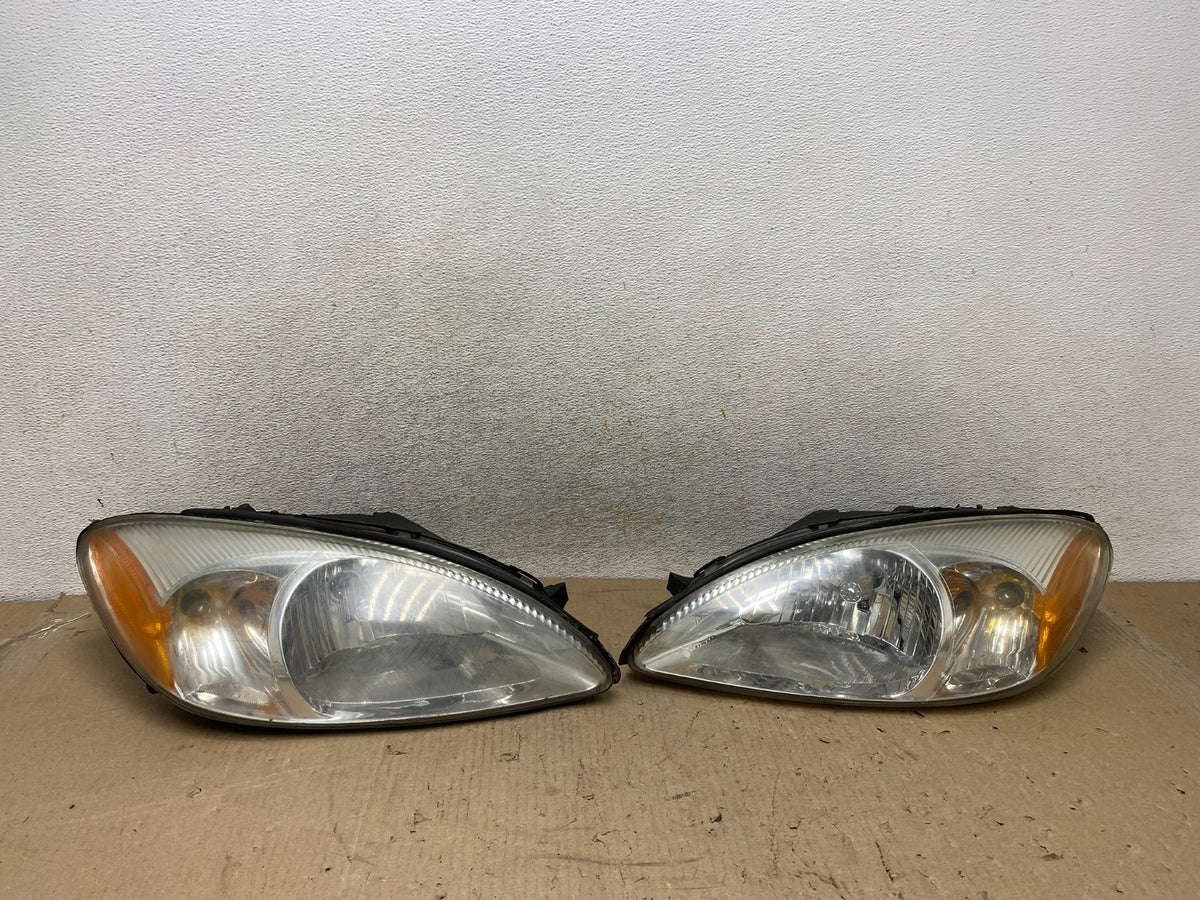2000 to 2007 Ford Taurus Left+Right Side Halogen Headlights AH7649 DW0
