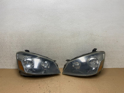 2005 to 2006 Nissan Altima Left+Right Side Set Halogen Headlights OEM U0368 DW0