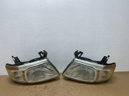 2008 to 2011 Mazda Tribute Left+Right Headlights Oem AC4005 DW0