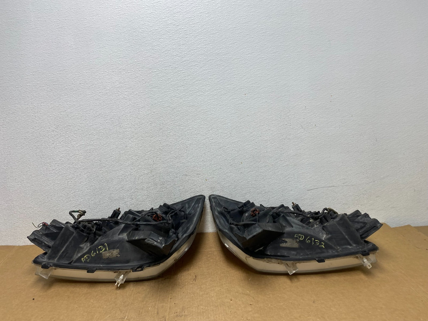 2004 to 2007 Nissan Armada Left+Right Side Set Headlights AD6132 DW10