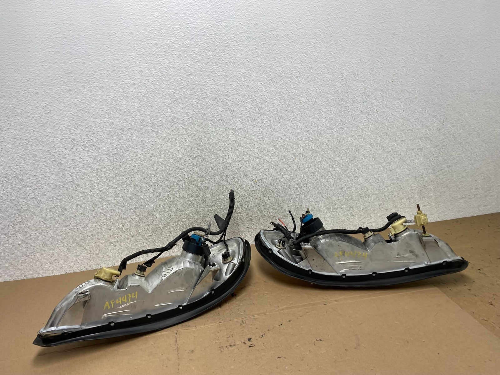 1999 to 2005 Pontiac Grand Am Left+Right Set Headlights AF4474 DW5