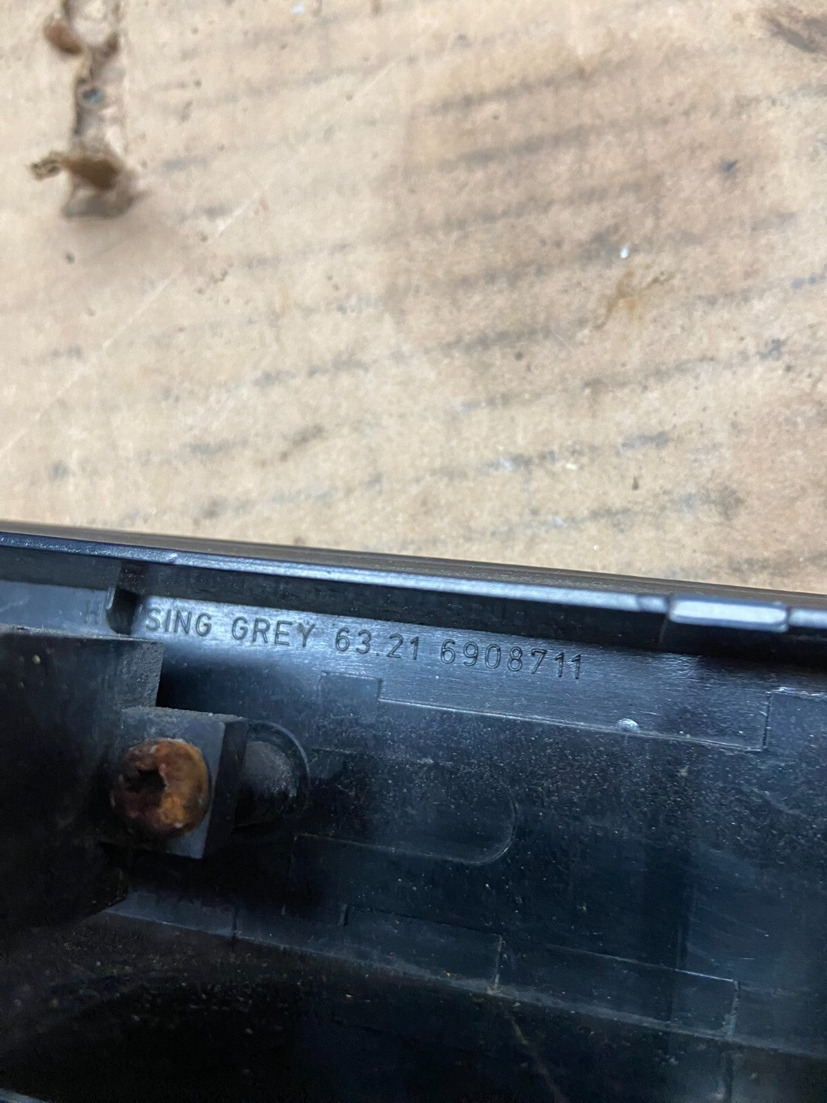 2002 to 2005 BMW Trunk Lid Center Garnish License Plate Light OEM I32826