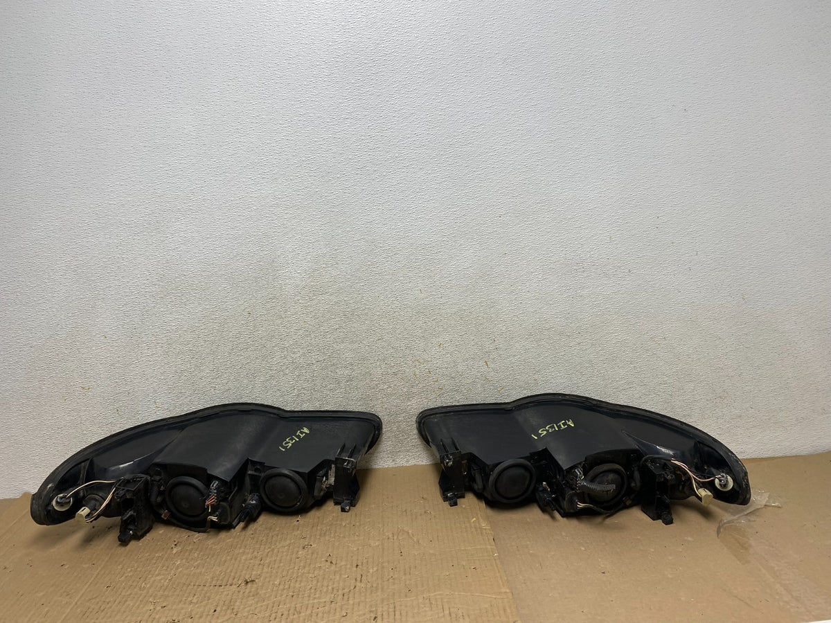 2000 to 2005 Chevrolet Monte Carlo Left+Right Side Set Headlights AI1351 DW6