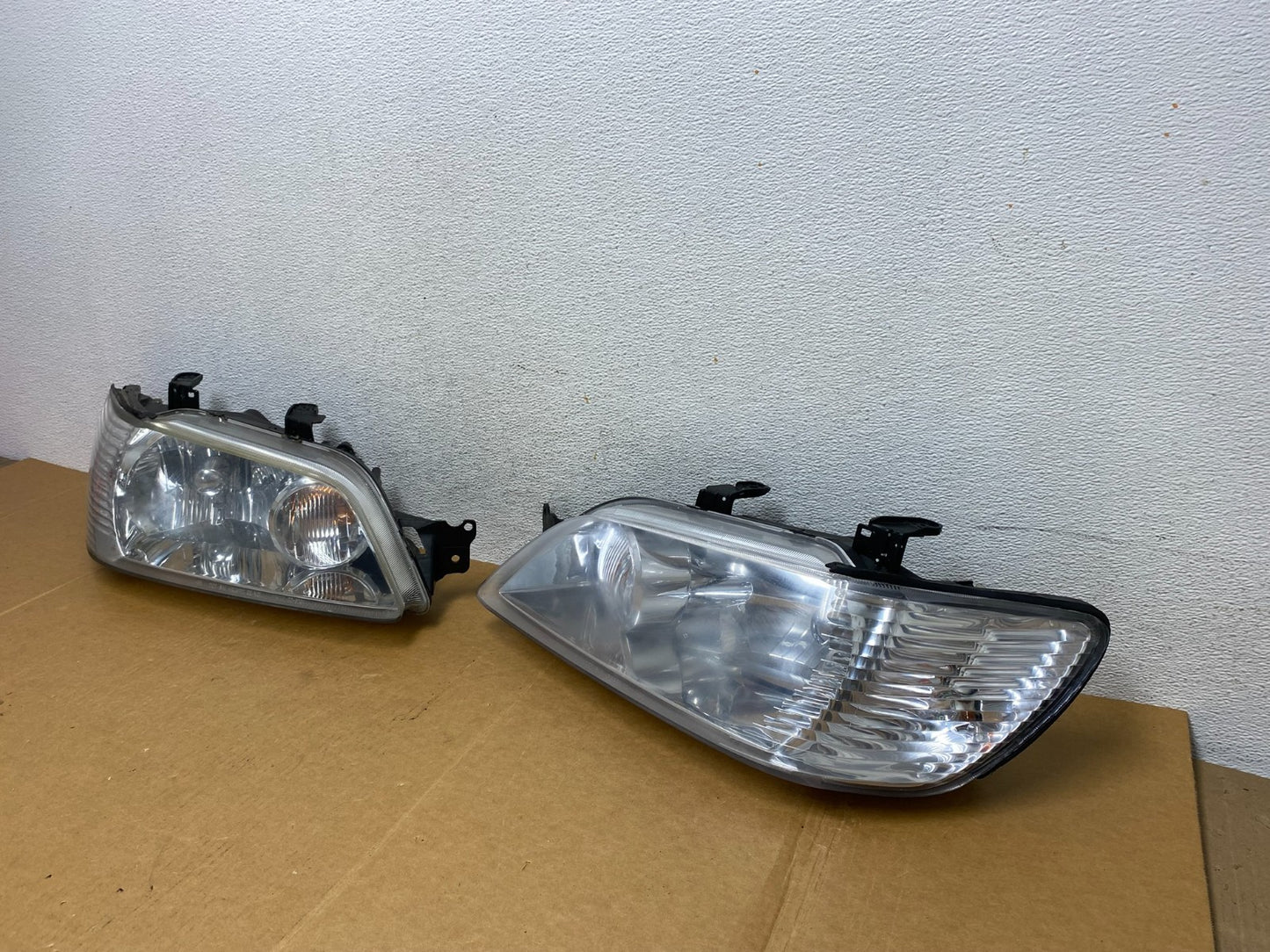 2002 - 2003 Mitsubishi Lancer Left+Right Side Headlights Halogen AD89391
