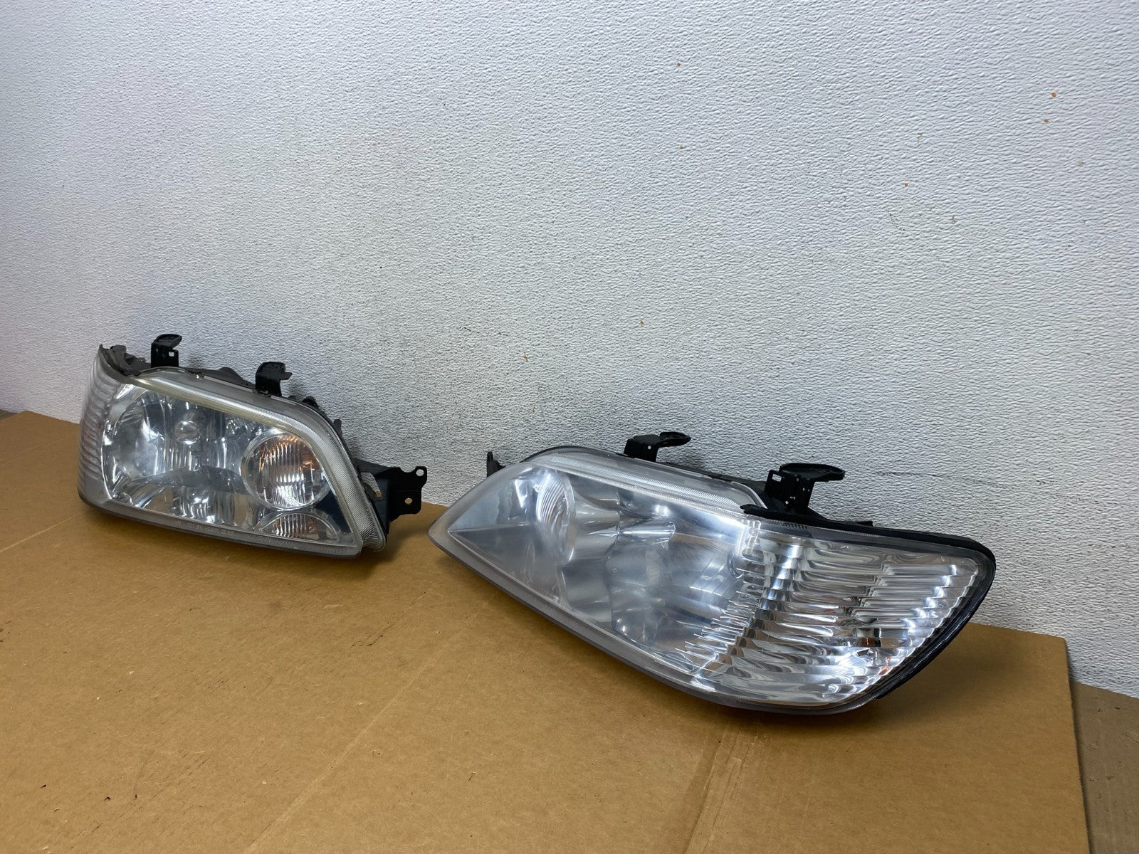 2002 - 2003 Mitsubishi Lancer Left+Right Side Headlights Halogen AD89391