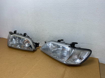 2002 - 2003 Mitsubishi Lancer Left+Right Side Headlights Halogen AD89391