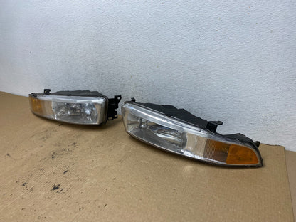 2002 to 2003 Mitsubishi Galant Left+Right Side Headlights AG2161 DW1