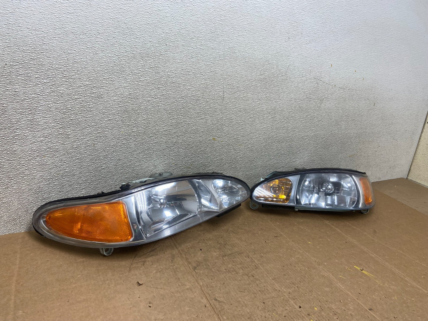 1998 to 2003 Ford Escort Left+Right Set Halogen Headlight Aftermarket AA1630 DG2