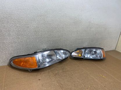 1998 to 2003 Ford Escort Left+Right Set Halogen Headlight Aftermarket AA1630 DG2