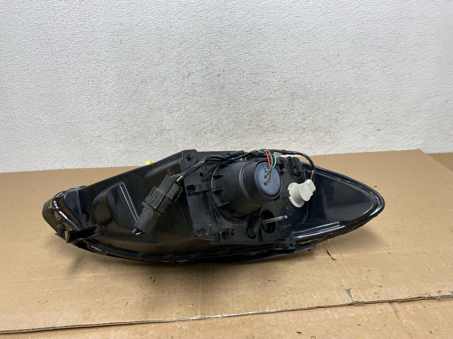 2000 to 2007 Ford Taurus Left Driver LH Side Halogen Headlight TYC AE5953 DW4
