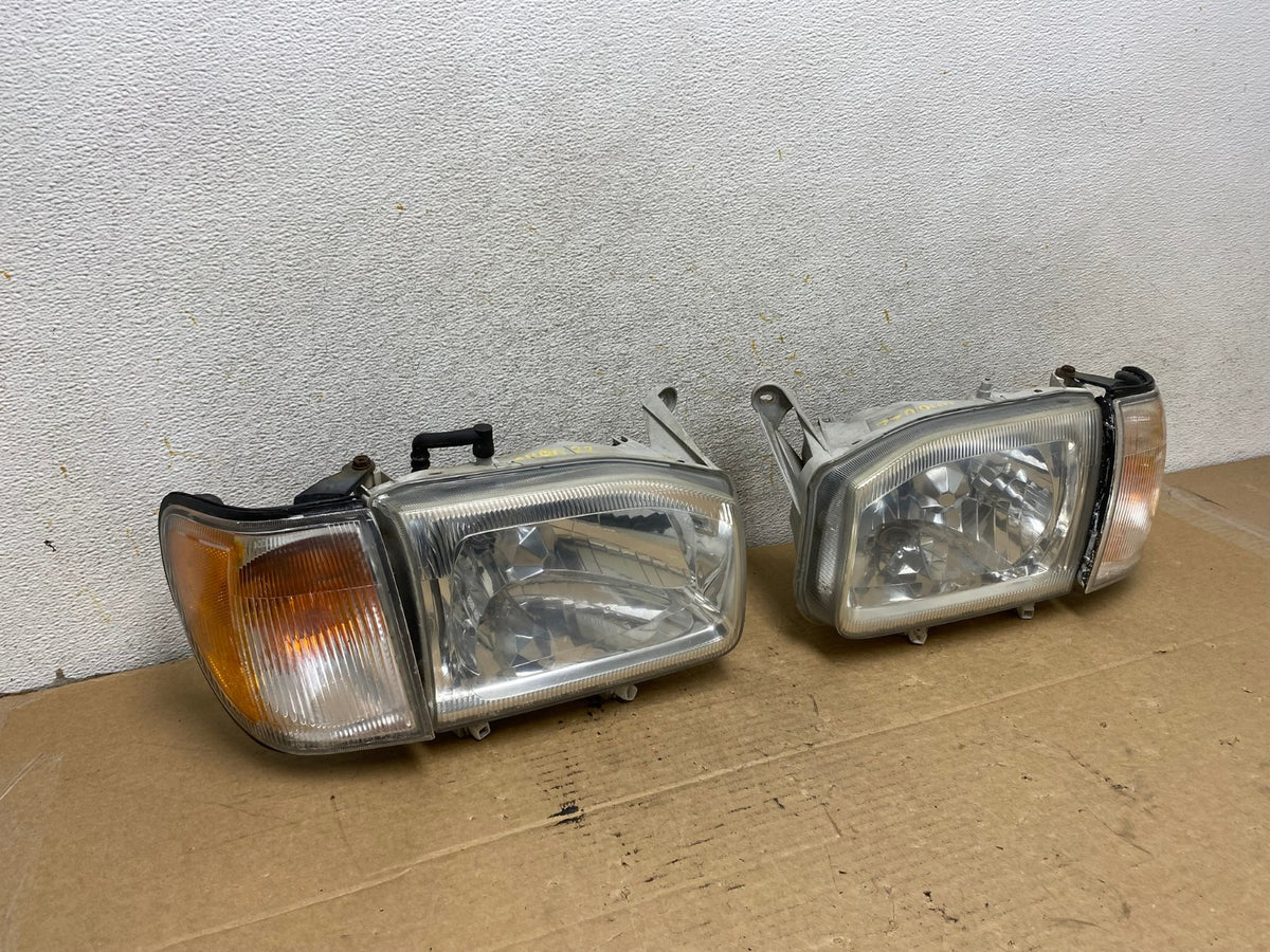 1999-2004 Nissan Pathfinder Left+Right Side Set Halogen Headlights AH8022 LK1