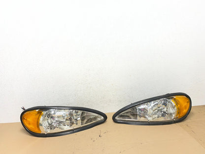 1999 to 2005 Pontiac Grand Am Left+Right Set Headlights AF4474 DW0