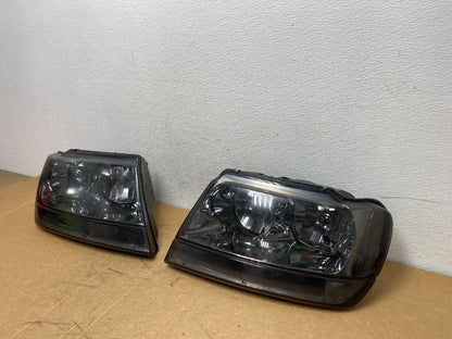 1999 - 2004 Jeep Grand Cherokee Left+Right Set Halogen Headlights AD6329 DW1