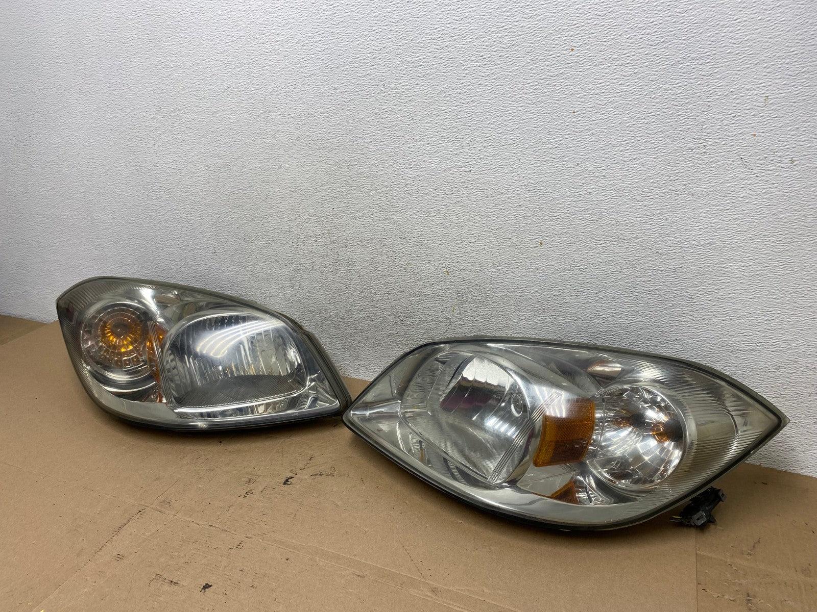 2005 - 2010 Chevrolet Cobalt Sedan Left+Right Headlights AF4422 LK1