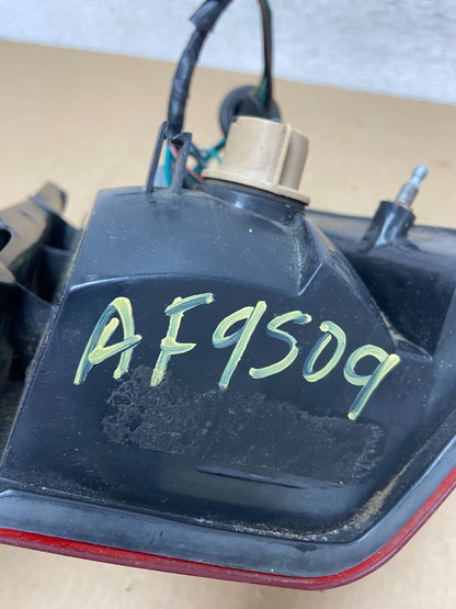 2002 2003 2004 Nissan Xterra Left Driver Side Tail Light AF9509 DW7