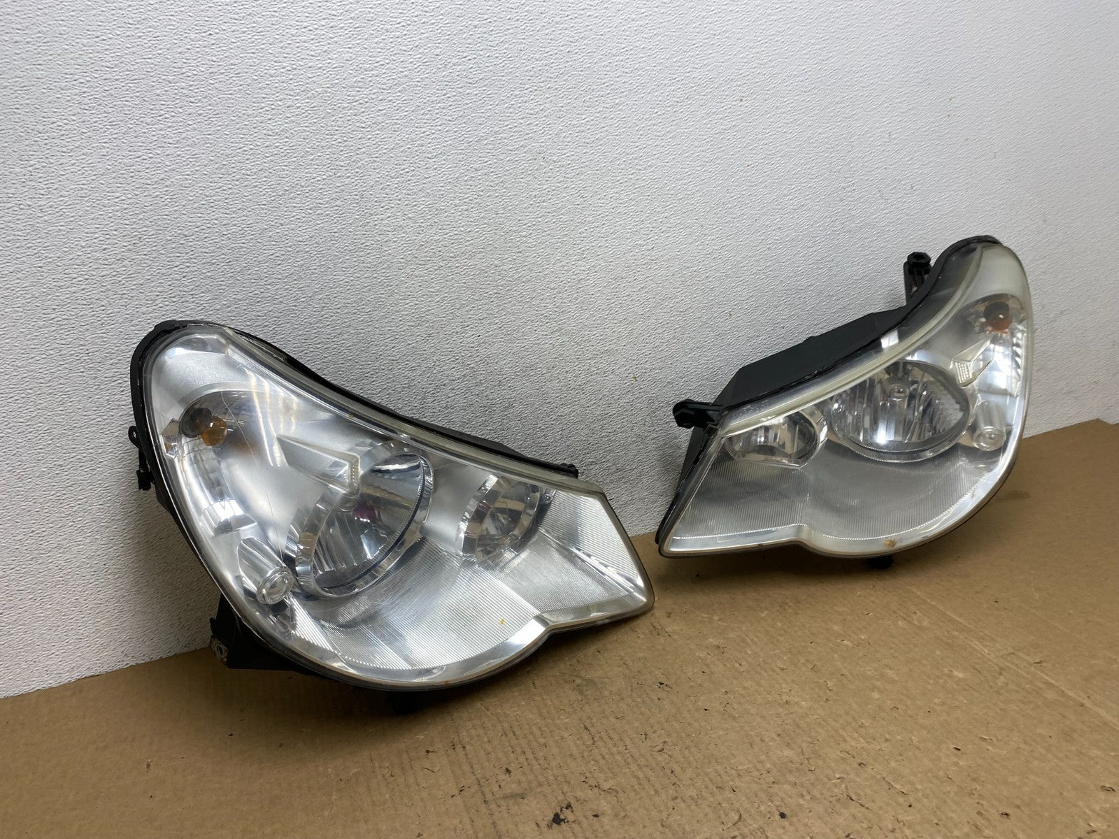 2007 to 2010 Chrysler Sebring Left+Right Side Headlights AF9867 DW2