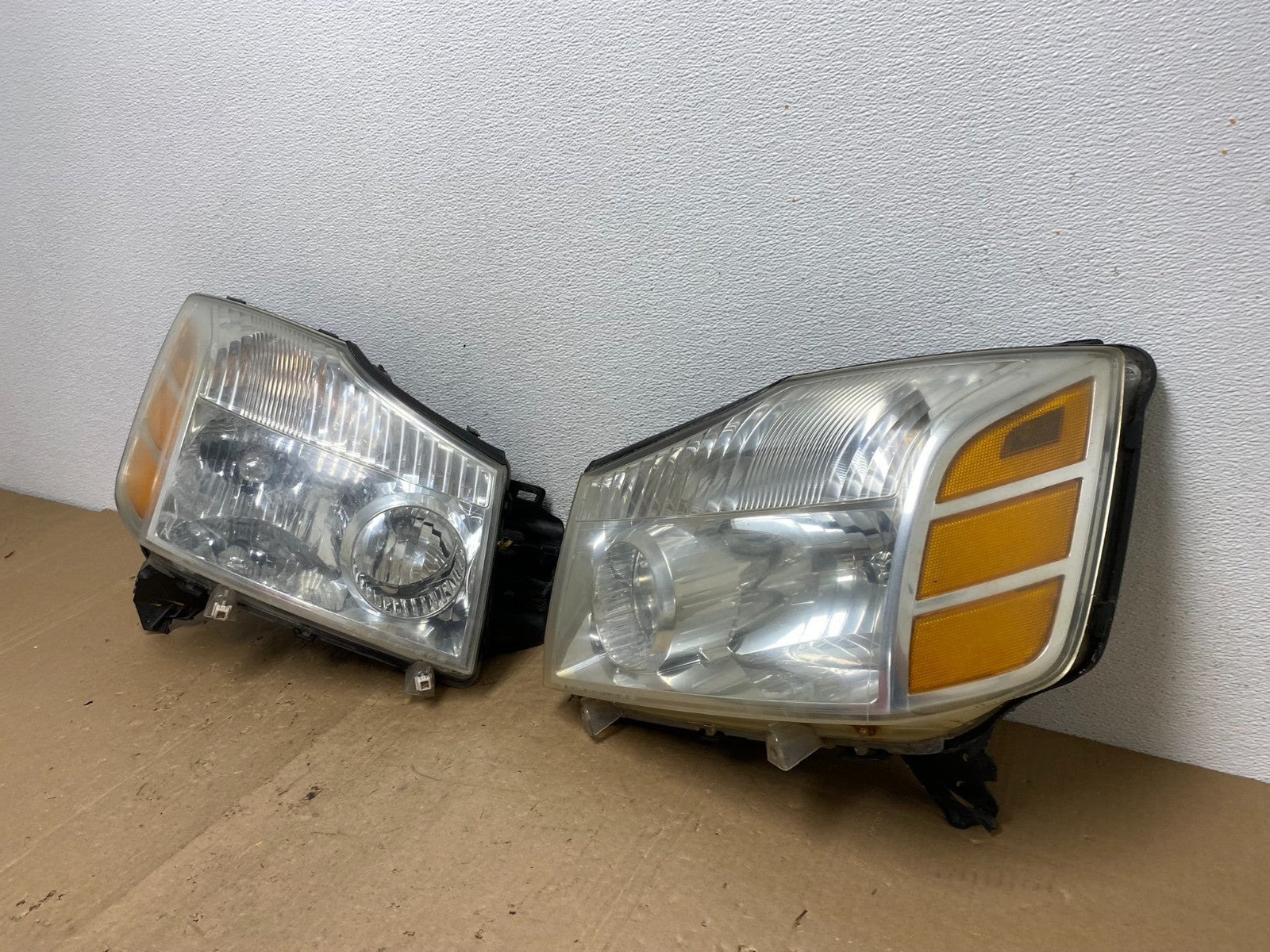 2004 to 2007 Nissan Armada Left+Right Side Set Headlights AC5970 DW1