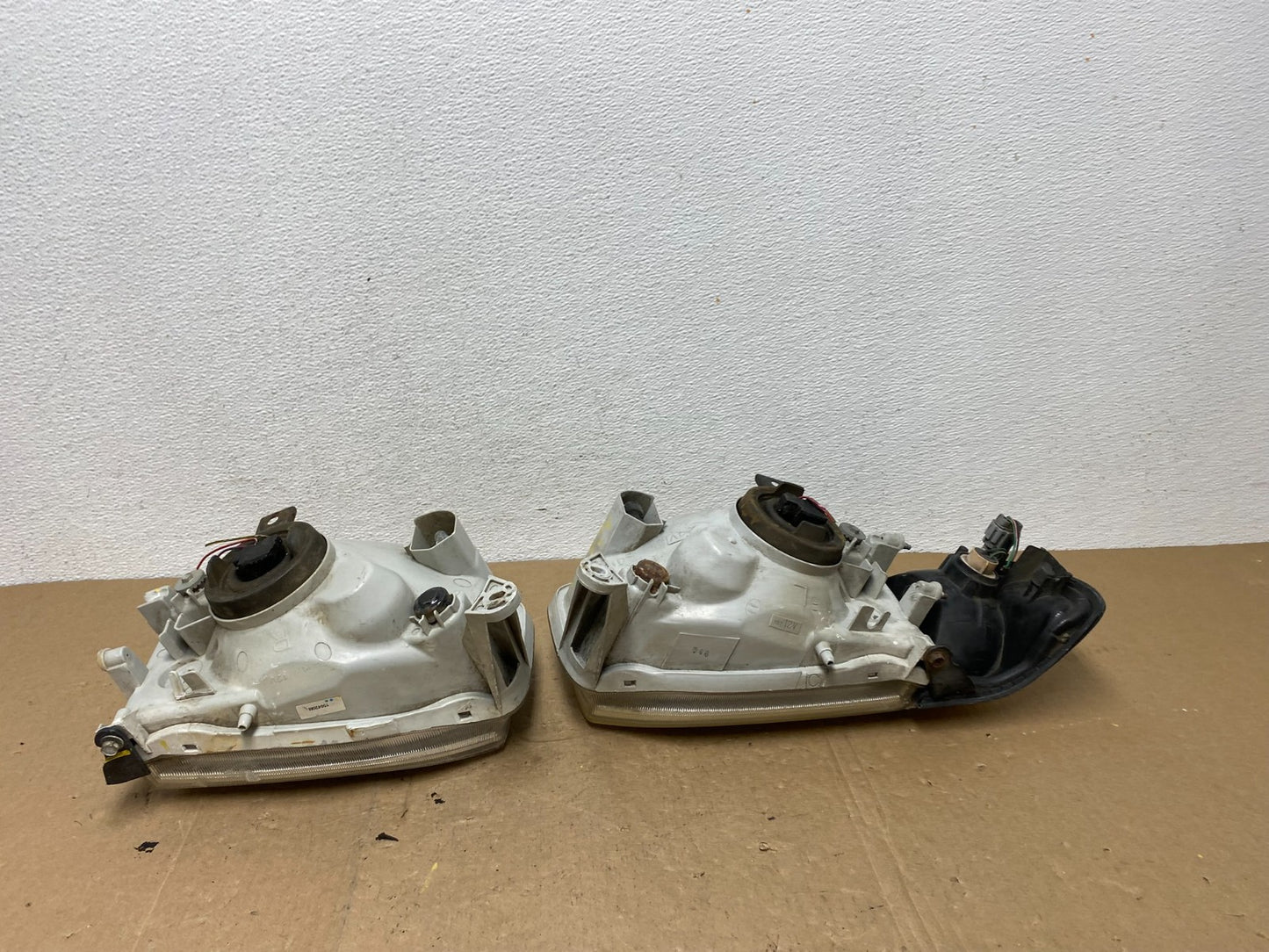 1999-2004 Nissan Pathfinder Left+Right Side Set Halogen Headlights AC5824 DW9