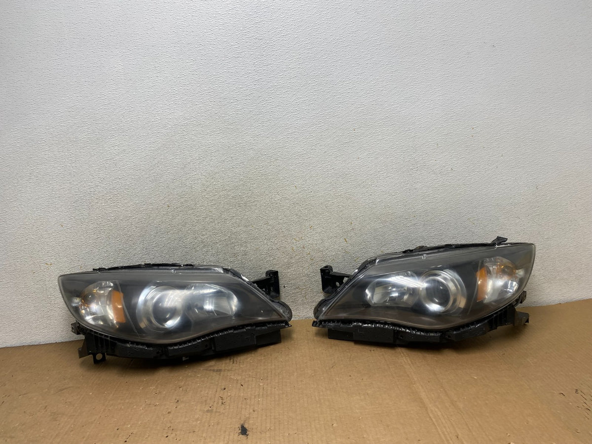 2008 to 2011 Subaru Impreza Left+Right Side Halogen Headlights TYC AI8815 DW0