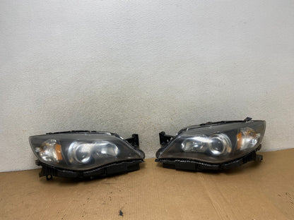 2008 to 2011 Subaru Impreza Left+Right Side Halogen Headlights TYC AI8815 DW0