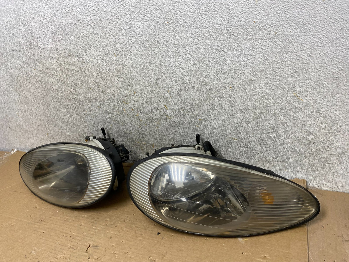 1996 to 1999 Mercury Sable Left+Right Side Set Halogen Headlights AH8393 DW1