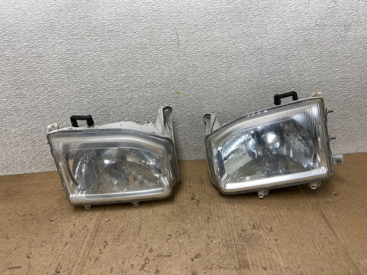 1999-2004 Nissan Pathfinder Left+Right Side Set Halogen Headlights Oem AA7153 DW0