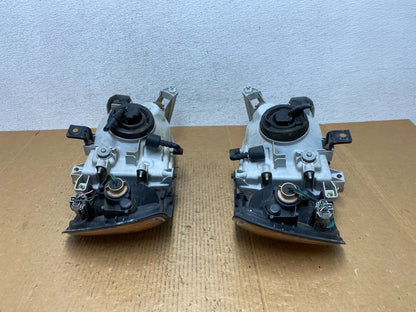 1999-2004 Nissan Pathfinder Left+Right Side Set Halogen Headlights AE1365 DW9