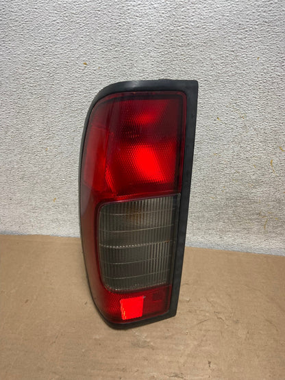 1998 1999 2000 Nissan Frontier Left Driver LH Side Tail light AH9403 LK0