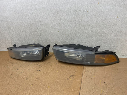 2002 to 2003 Mitsubishi Galant Left+Right Side Headlights S9237 DW1
